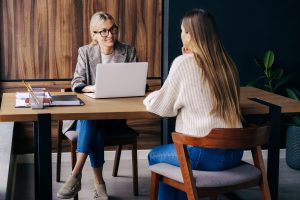 HR professional meeting with an employee